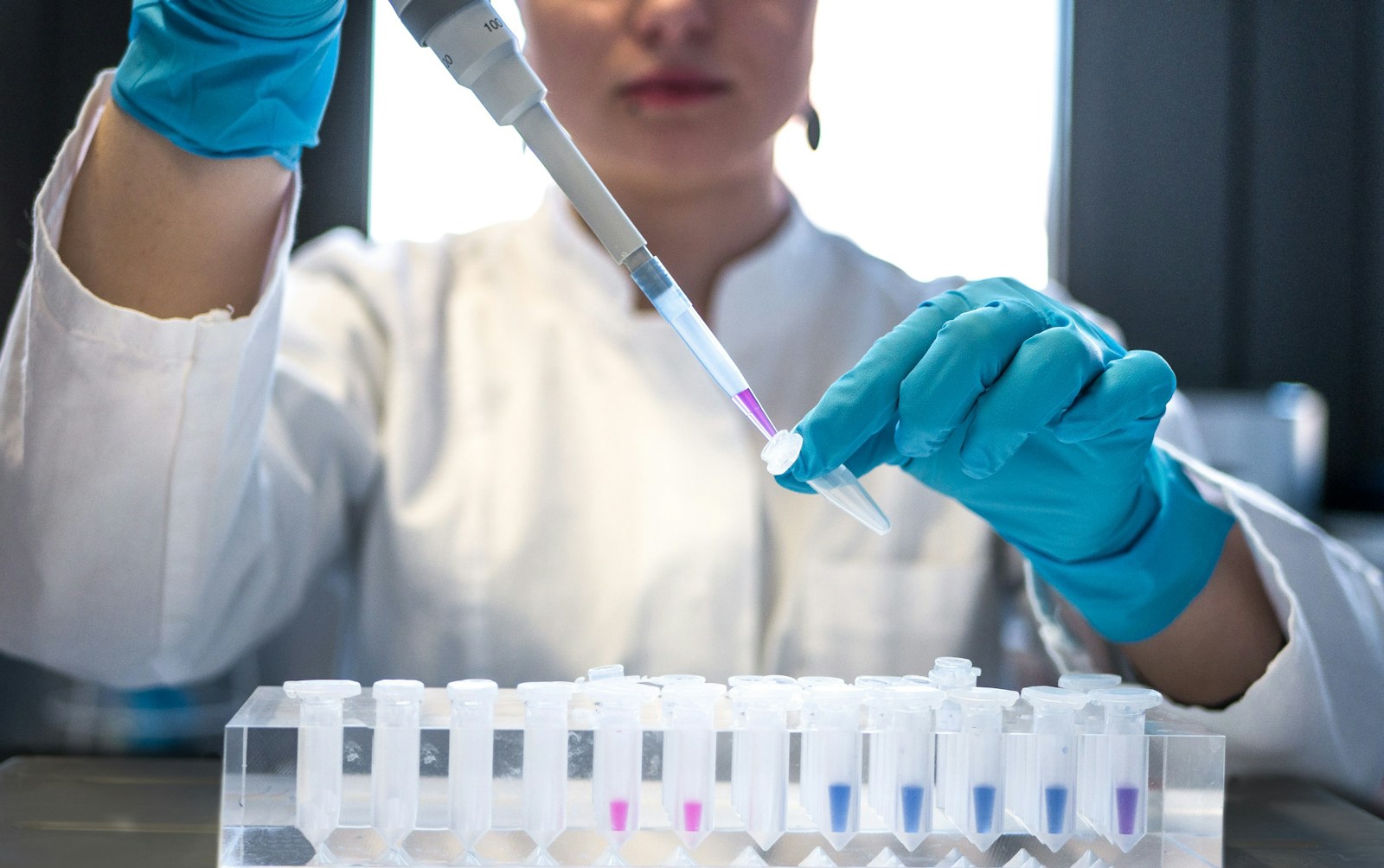 Scientist conducting laboratory research with scientific equipment